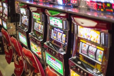 Mobile phone displaying Street Racing Game interface with live video and betting controls